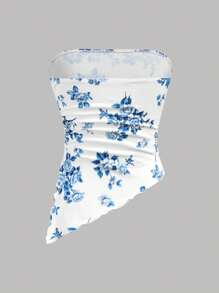 Girlism مجموعة بقطعتين للمراهقات تشمل: توب بخصر قصير مزين بطبعة زهور زرقاء وبيضاء مع كشكشة على الهيم غير متماثل، تنورة ميني متعددة الطبقات