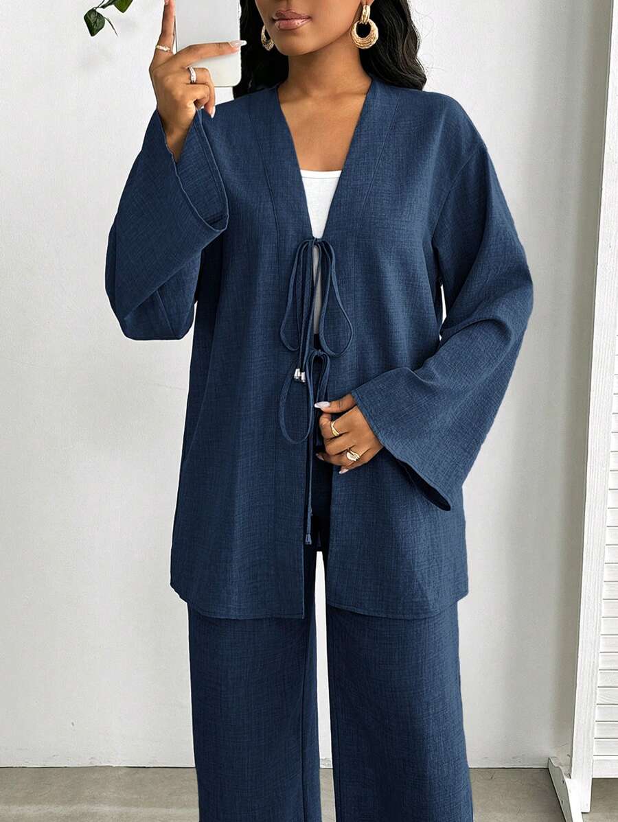 SHEIN Lady Conjunto de 2 piezas de talla grande para mujer, top de manga larga con nudo delantero y pantalones, de color azul denim sólido. Conjunto de 2 piezas de talla grande para mujer, conjunto de playa casual para mujer de negocios