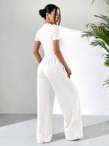 SHEIN EZwear Conjunto de 2 piezas de camiseta de manga corta ajustada blanca de verano y pantalón de chándal holgado - Blanco - Ver 2