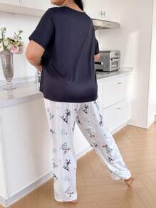 SHEIN Conjunto de pijama con estampado de animales de dibujos animados, de manga corta y pantalones cortos, para talla grande