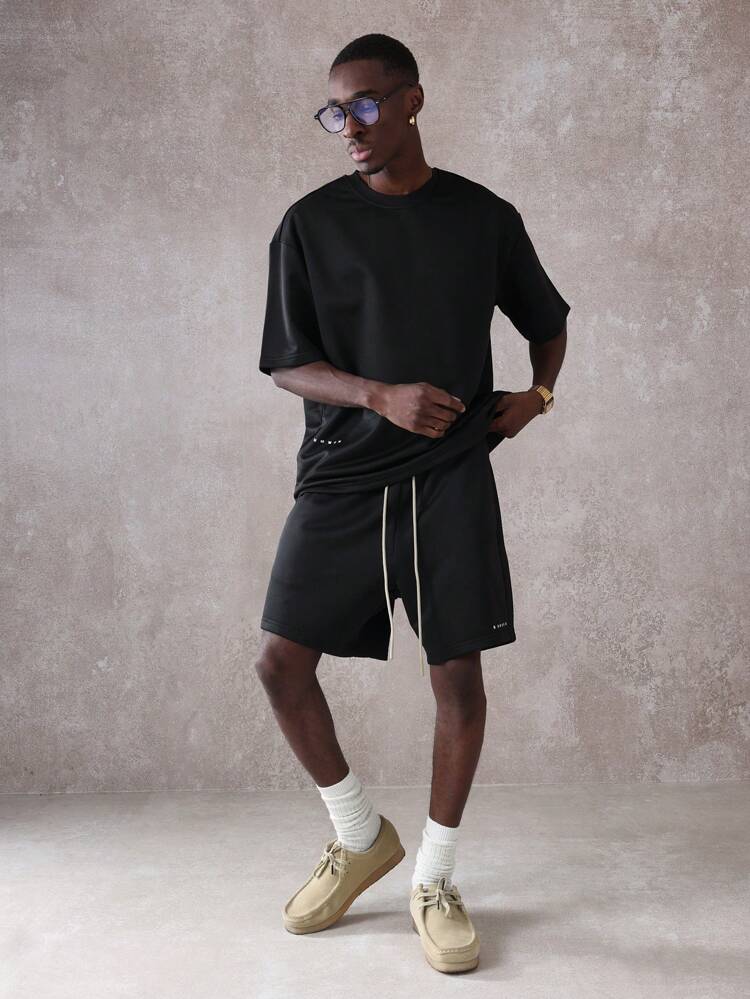 Conjunto coordenado de camiseta esportiva grande e confortável