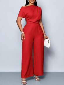 SOLERSUN Bộ jumpsuit nữ cỡ lớn thời trang, màu trơn, dáng rộng, thanh lịch, phù hợp cho đi làm và du lịch hàng ngày, dễ phối đồ. Thiết kế xếp ly trễ vai, cổ áo bất đối xứng, tay ngắn và ống quần rộng. Kín đáo, hoàn hảo cho các bữa tiệc, những dịp lãng mạn, Ngày Valentine, Ngày Thánh Patrick, Lễ Phục Sinh. - Đỏ - Xem 5