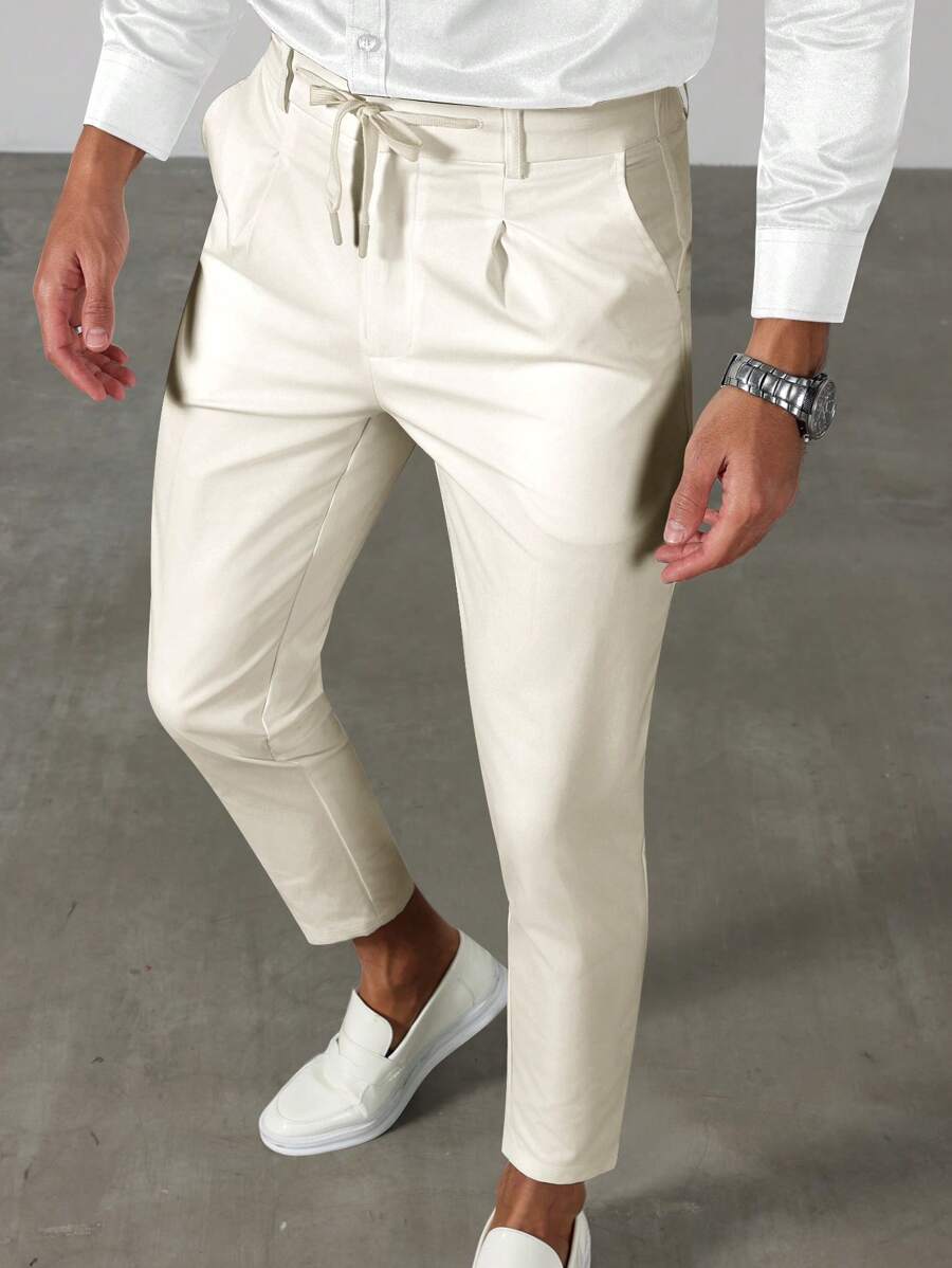 Manfinity Bizformal Quần tây công sở nam phong cách giản dị, INS kết hợp với quần tây tiết kiệm chi phí. Sản phẩm này có thiết kế thắt lưng, phù hợp để đi làm, tiệc tùng và mặc hàng ngày. Sản phẩm cũng là món quà lý tưởng cho bạn trai hoặc chồng. Quần tây công sở nam màu trơn có dây rút eo, quần âu nam quần âu nam quần âu nam - Màu be - Xem 1