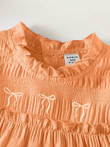 SHEIN Babygirl Summer Light Blue Sweet Bow Embroidered Cake Dress, With Little Flutter Sleeves And Ruffled Collar Design, A Perfect Blend Of Elegance And Cuteness. The Bow Embroidery On The Chest Adds A Touch Of Playfulness. Ideal For Sunny Summer Outings, Perfect For Lounging At Home, And Attending Family And Friends' Parties, Making It The Ultimate Choice For Various Occasions. - Orange - View 4