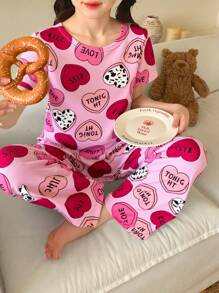 Set de 2 pièces de pyjama pour adolescentes, tenue décontractée confortable avec imprimé cœurs sur tout le Top à col rond à manches courtes et pantalon long