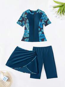 Swim Mulvari 女士沙滩装：热带树叶印花拼接黑色拉链上衣、带抽绳下摆的黑色骑行短裤和黑色比基尼裙套装