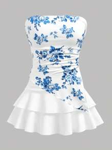 Girlism مجموعة بقطعتين للمراهقات تشمل: توب بخصر قصير مزين بطبعة زهور زرقاء وبيضاء مع كشكشة على الهيم غير متماثل، تنورة ميني متعددة الطبقات