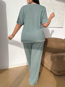SHEIN Plus Size Women 1 zestaw jednokolorowej dzianiny z prążkowanym wykończeniem, piżama, top i spodnie, stroje - Miętowy Zielony - Zobacz 2