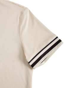 Manfinity Homme Conjunto casual de dos piezas para hombre con camiseta de manga corta de cuello redondo con estampado de rayas y shorts con cordón en la cintura
