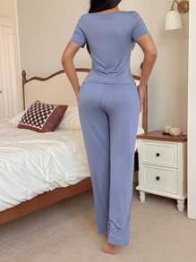 Conjunto de pijama informal de mujer con top de manga corta con lazo y pantalones