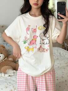 SHEIN Conjunto informal de niña preadolescente con estampado animal, top de manga corta y pantalones largos de ajuste relajado, adecuado para el verano