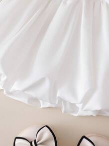 SHEIN Genkimix Kids Baby Girls' Solid Color A-Line Bubble Skirt. The Solid Color Tone Showcases An Elegant Style, While The Bubble Design Adds A Cute Touch.