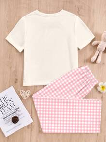 SHEIN Conjunto informal de niña preadolescente con estampado animal, top de manga corta y pantalones largos de ajuste relajado, adecuado para el verano
