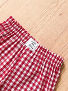 SHEIN Conjunto de 2 piezas para verano: Camiseta de punto de manga corta con cuello redondo y estampado de cerezas + pantalones cortos rojos a cuadros holgados para niñas