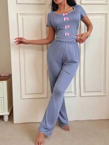 Conjunto de pijama informal de mujer con top de manga corta con lazo y pantalones