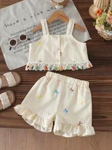 SHEIN Conjunto de 2 piezas para niñas pequeñas con blusa de tirantes con bordado floral de jardín y pantalones cortos - Blusa de tirantes con volantes + pantalones cortos, lindo y dulce look de moda