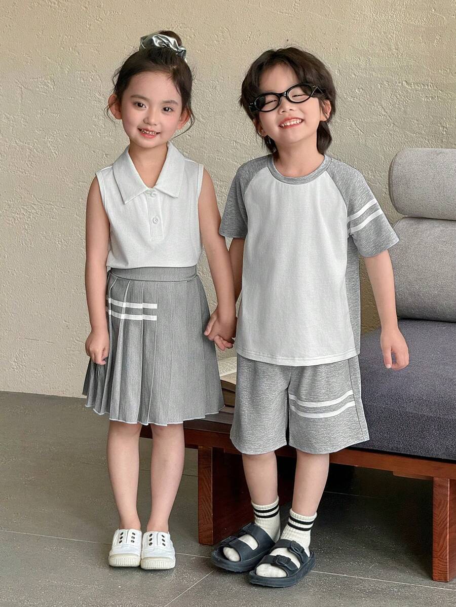Conjunto de niña pequeña de verano casual, con parte superior de tirantes sin mangas de cuello simple y falda plisada de estampado a rayas. Lindo conjunto para hermanos - Multicolor - Ver 1