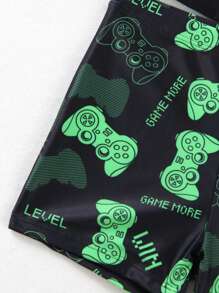 SHEIN Young Boys' Hazy Blue Print Swimsuit Top With Printed Front Panel And Random Print Swim Shorts, 2 Pieces Set