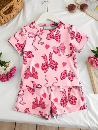 SHEIN Leap Crew Young Girl Bow Pattern Casual Minimalist Snug-Fit Round Neck Short Sleeve Shorts Pajamas, Suitable For All Seasons