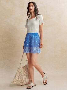 Écloséra Pantalones cortos de mujer con cintura elástica y bordado azul para vacaciones de verano