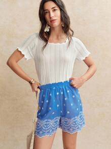 Écloséra Pantalones cortos de mujer con cintura elástica y bordado azul para vacaciones de verano