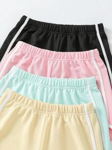 SHEIN Conjunto de shorts informales de estilo callejero y de universidad con colores contrastantes para niñas preadolescentes