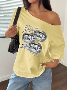 Flirla Camiseta suelta con hombros descubiertos, camiseta gráfica oversize con hombros descubiertos para mujer, blusas gráficas para mujer