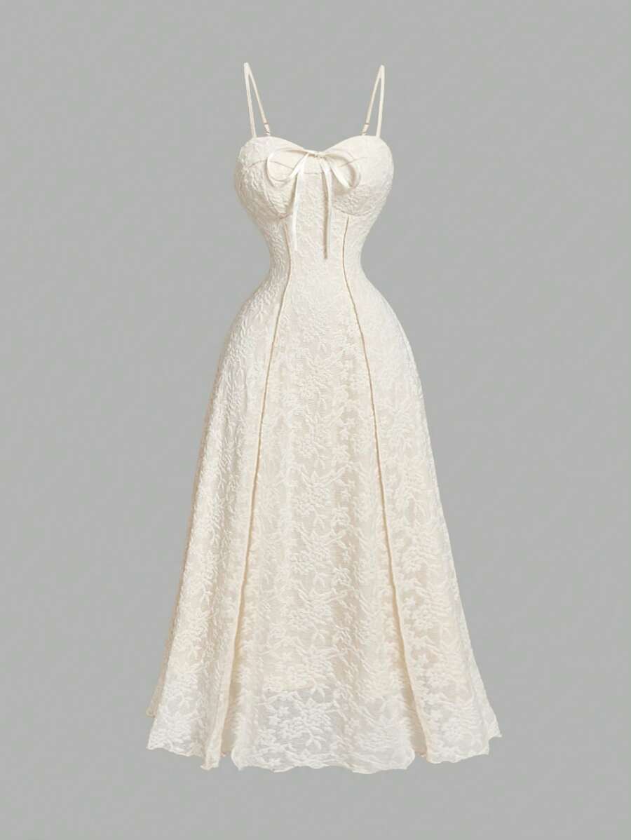 SHEIN X Hannahelzahed SHEIN MOD 蜜桃色吊带连衣裙,腰间饰有蝴蝶结,裙摆开衩,采用植绒面料设计,喇叭裙摆,适合派对、波西米亚风、热带风、优雅、度假、早午餐、西式、波西米亚风连衣裙、毕业礼服、婚礼宾客礼服、情人节、音乐节、外出等场合。 - 杏色 - 查看 1