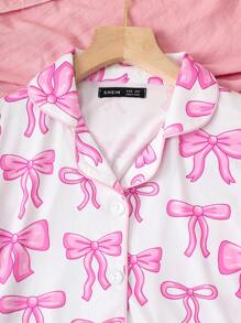 Pijamas adorables y dulces con estampado de lazo para niñas