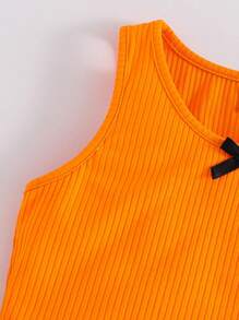 SHEIN Parte superior de tirantes con lazo frontal en estilo casual de calle para niñas preadolescentes