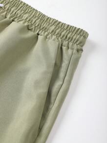 Manfinity KASUA Conjunto de camisa de manga corta con estampado de plantas tropicales y pantalones cortos para hombres, traje de baño y atuendo de vacaciones para hombres, hawaiano
