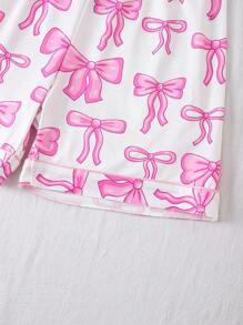 Pijamas adorables y dulces con estampado de lazo para niñas