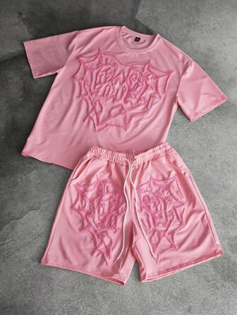 Manfinity Streetrush Herren Set mit herzförmig besticktem pinkem T-Shirt