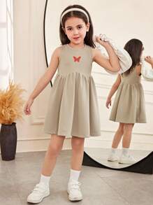 SHEIN Vestido informal para niña con escote redondo, sin mangas, con estampado de mariposa, y diseño asimétrico partido