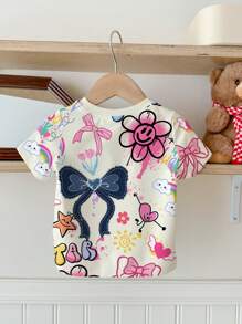 SHEIN Baby Girl Casual Cute Graffiti Cartoon Smiling Face, Bow Print Short Sleeve Crew Neck Top, Suitable For Summer - Multicolor - View 4