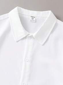 SHEIN Tween Boy Resort-Style Solid Color Lapel Collared Slim Fit Woven Short Sleeve Shirt