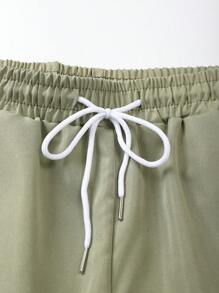 Manfinity KASUA Conjunto de camisa de manga corta con estampado de plantas tropicales y pantalones cortos para hombres, traje de baño y atuendo de vacaciones para hombres, hawaiano
