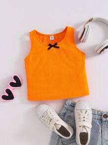SHEIN Parte superior de tirantes con lazo frontal en estilo casual de calle para niñas preadolescentes