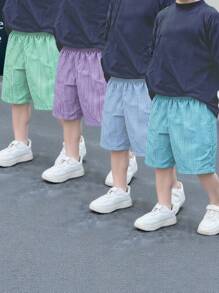 Set de 4 pantalones cortos de verano casuales y versátiles con textura de rayas para niños