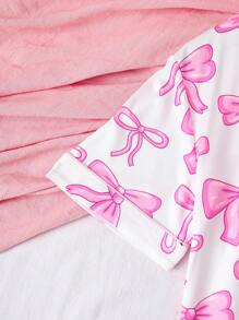 Pijamas adorables y dulces con estampado de lazo para niñas