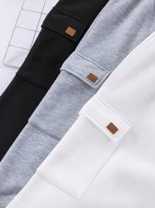 3 chiếc quần nỉ thể thao dáng rộng, có túi vá, cạp chun, dành cho bé trai tuổi teen, nhiều màu sắc. - Đen và trắng - Xem 5