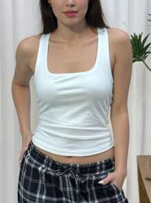 Canotta minimalista da donna per l'estate, con collo quadrato, aderente, con incrocio sulla schiena, di colore unico