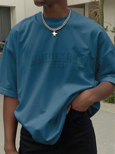 Manfinity Homme 大码男士短袖连体衣，oversize，男士休闲简约字母标语刺绣工艺T恤，宽松落肩休闲短袖T恤，浅卡其米色麂皮纹理面料T恤，年轻街头潮流，热销，送给男朋友的礼物，年轻休闲运动街头日常通勤百搭返校度假装，送给男朋友和老公的礼物首选，情侣装