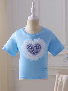 SHEIN 2 pezzi Set bambina - maglietta a maniche corte con scollo tondo e cuore 3D + gonna a ruota stile torta. Design elegante a cuore 3D, gonna a ruota stile torta, adatta per gioco all'aperto, casual a casa, attività scolastiche, feste di compleanno e altre occasioni, permettendo alla tua piccola principessa di godersi l'estate gioiosa! - Multicolore - Visualizzare 13