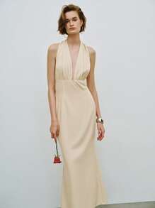 Lumivelle Vestido largo con cuello en V profundo, lazo y espalda descubierta