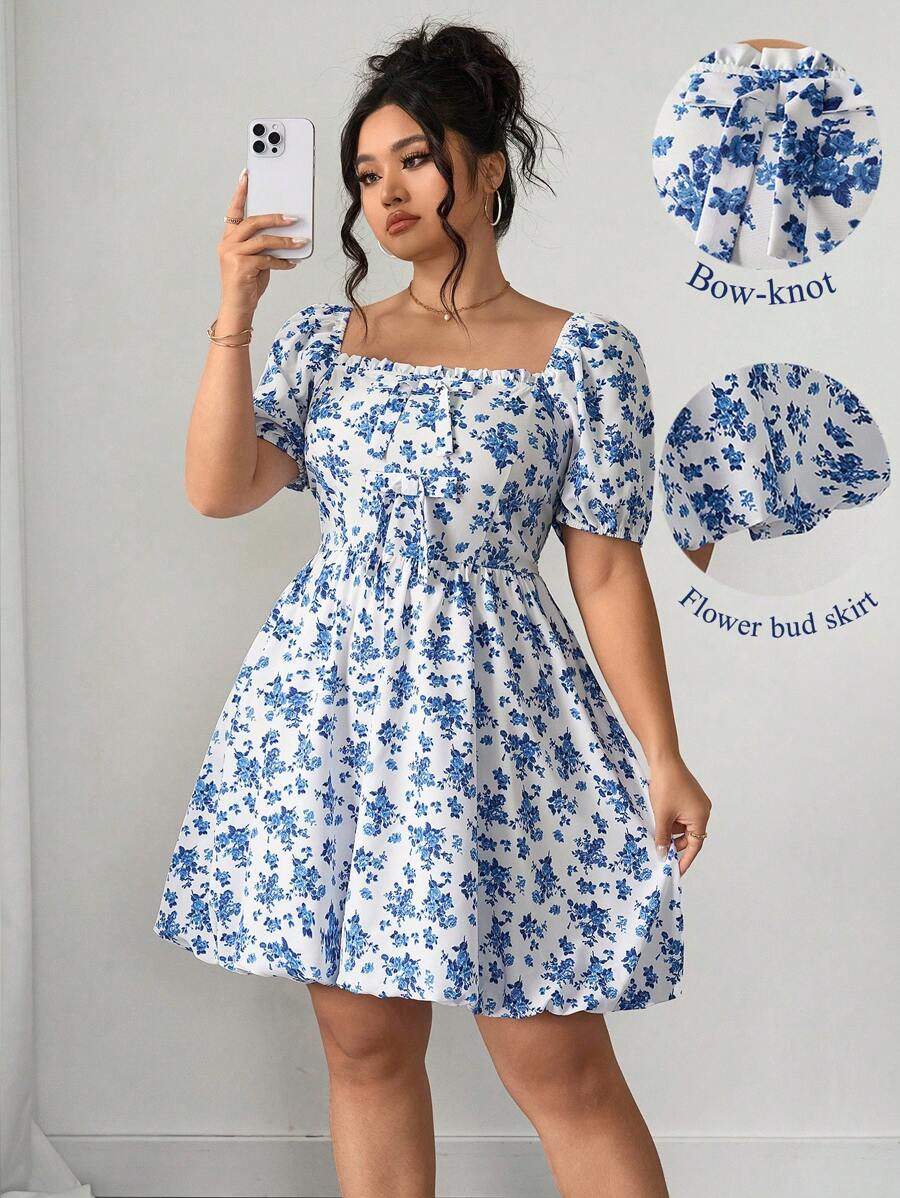 SHEIN Unity فستان قصير بكم قصير للسيدات ذوات الحجم الكبير مع طبعة أزهار باللونين الأزرق والأبيض وعقدة وردية مناسب للاجازات