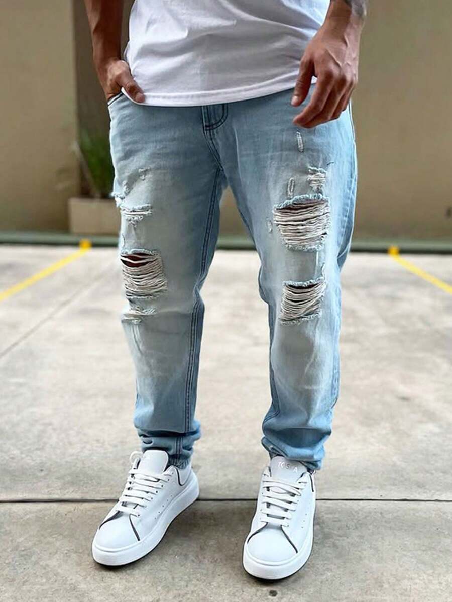 Manfinity Homme Celana Jeans Pria Polos dengan Saku Sobek, Model Kasual, dan Potongan Meruncing. - Light Wash - View 1