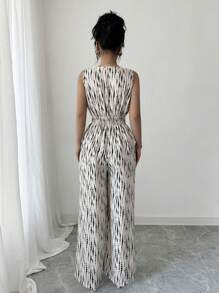 Elenzga 2025 Spring & Summer New Style Casual Black & Apricot Printed Vacation & Commute Cross V-Neck Cinched Waist Sleeveless Jumpsuit