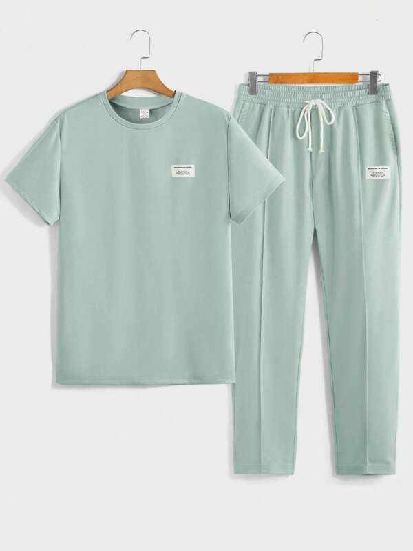SHEIN 2 stuks/set tienerjongens casual losse comfortabele effen kleur veelzijdige korte mouw top en rechte pijp broek pak