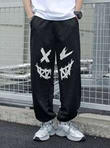 SHEIN Pantaloni de trening negri imprimați cu model de desene animate pentru adolescenți, colegii casual, comozi și la modă, versatil, țesătură moale, potriviti pentru uzura zilnică, școală, călătorii, sporturi în aer liber, primăvară/vară